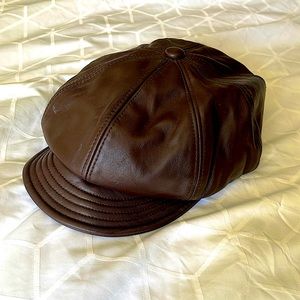 100%leather Liz Claiborne.Newsboy Cap.Fits all sizes.tiny spot.$ below market